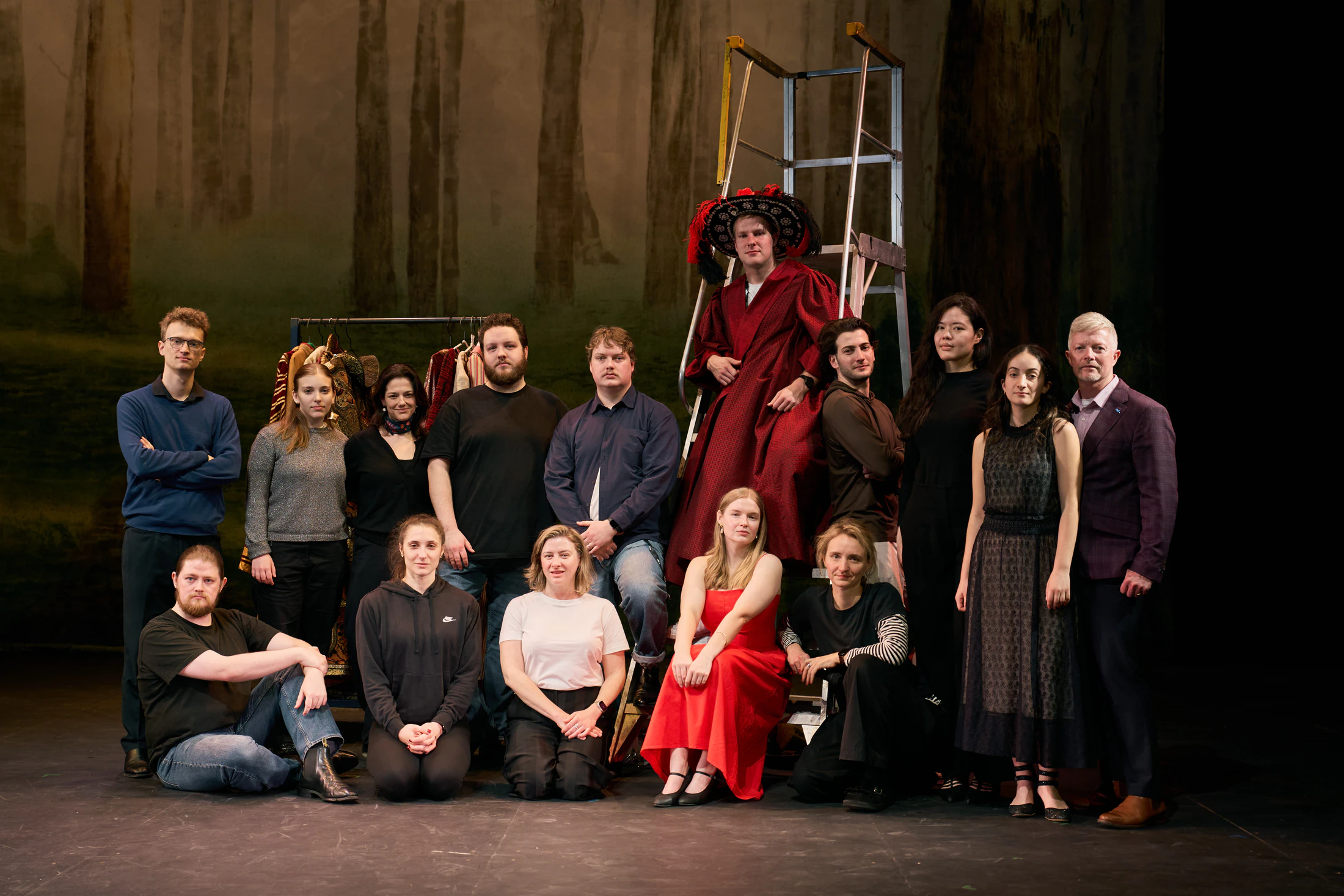 The young artists and company gather for a group photo on stage